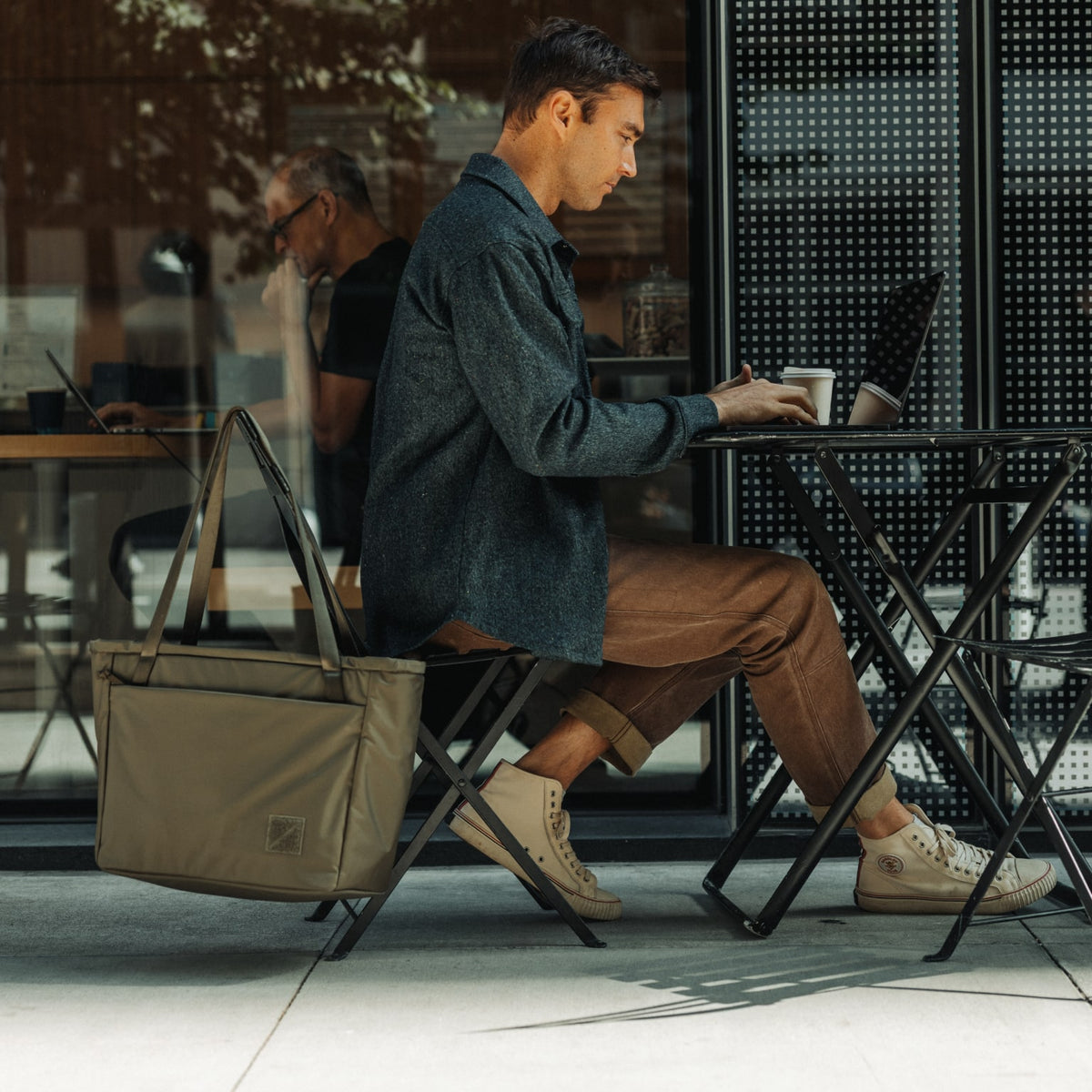 CIVIC Daily Tote 24L in OD Green - CDT24 - hanging next to desk while working remotely CIVIC Daily Tote 24L in OD Green - CDT24 - hanging next to desk while working remotely [13024a-ODG