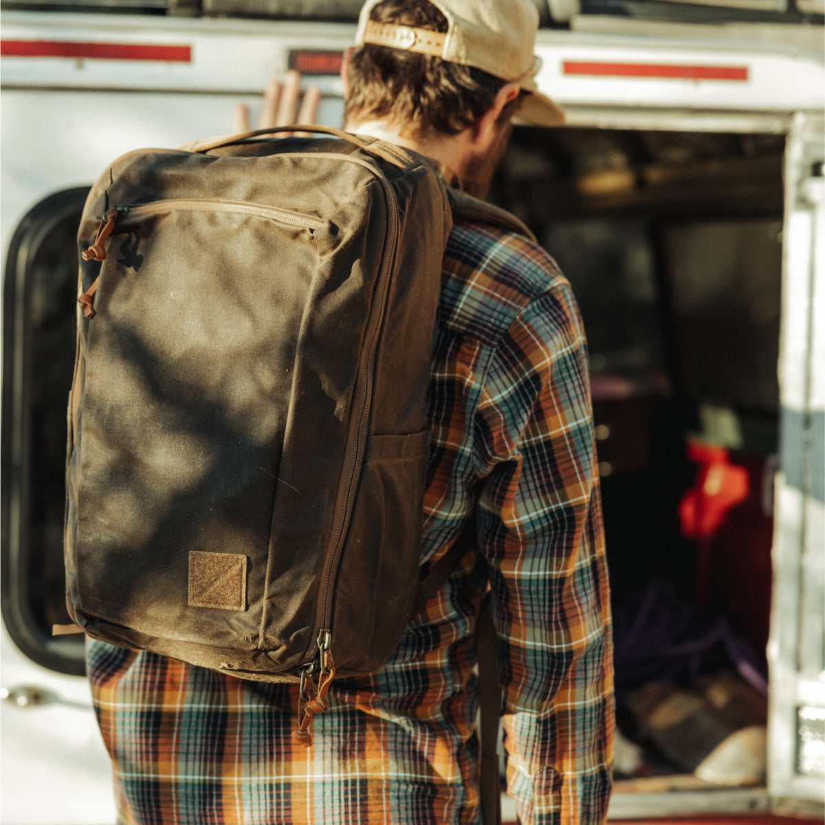 CIVIC Travel Bag 26L in Waxed Canvas - Waxed Tan - on back CIVIC Travel Bag 26L in Waxed Canvas - Waxed Tan - on back [13012cc-WTN