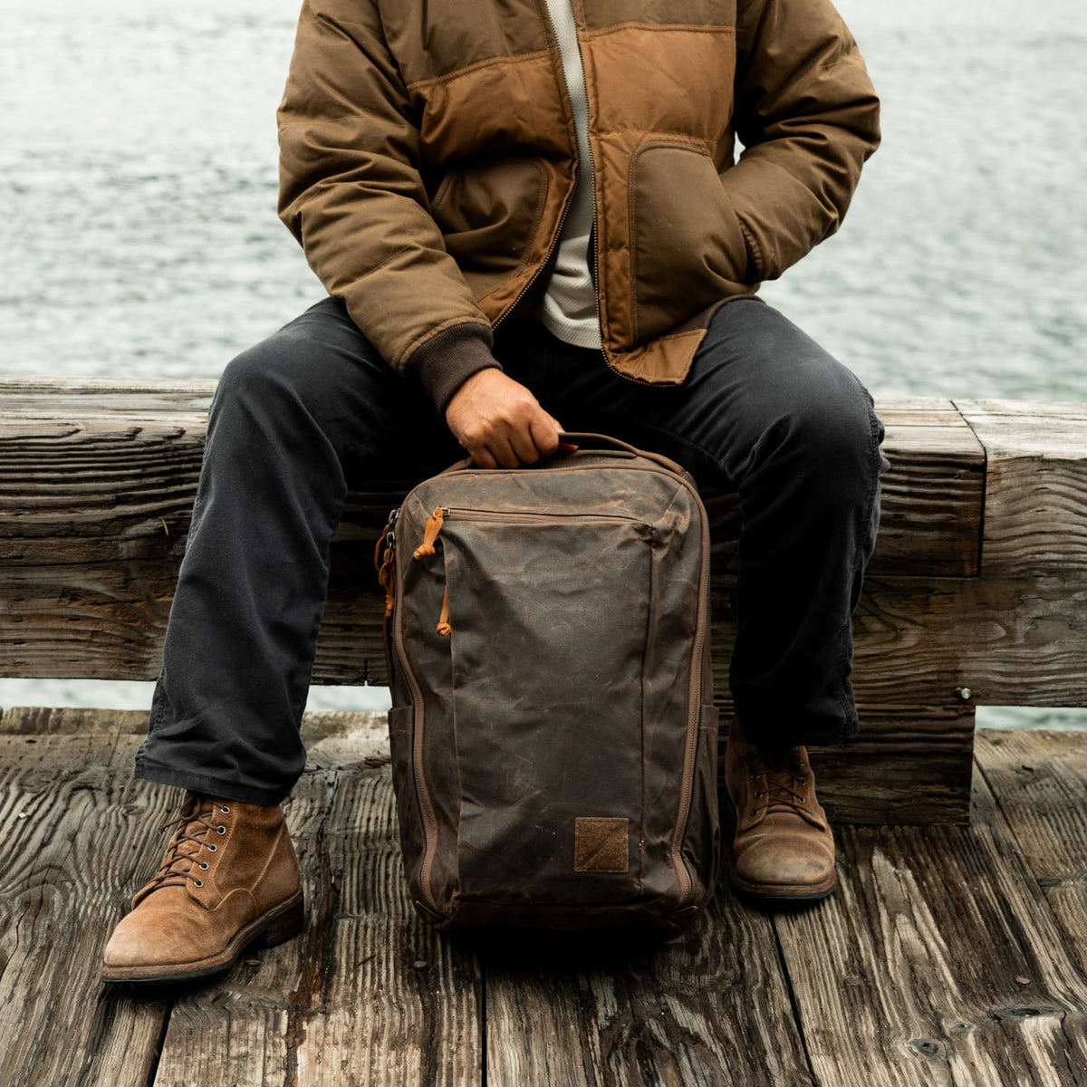 CIVIC Travel Bag 26L in Waxed Canvas - Waxed Tan - on ground CIVIC Travel Bag 26L in Waxed Canvas - Waxed Tan - on ground [13012cc-WTN