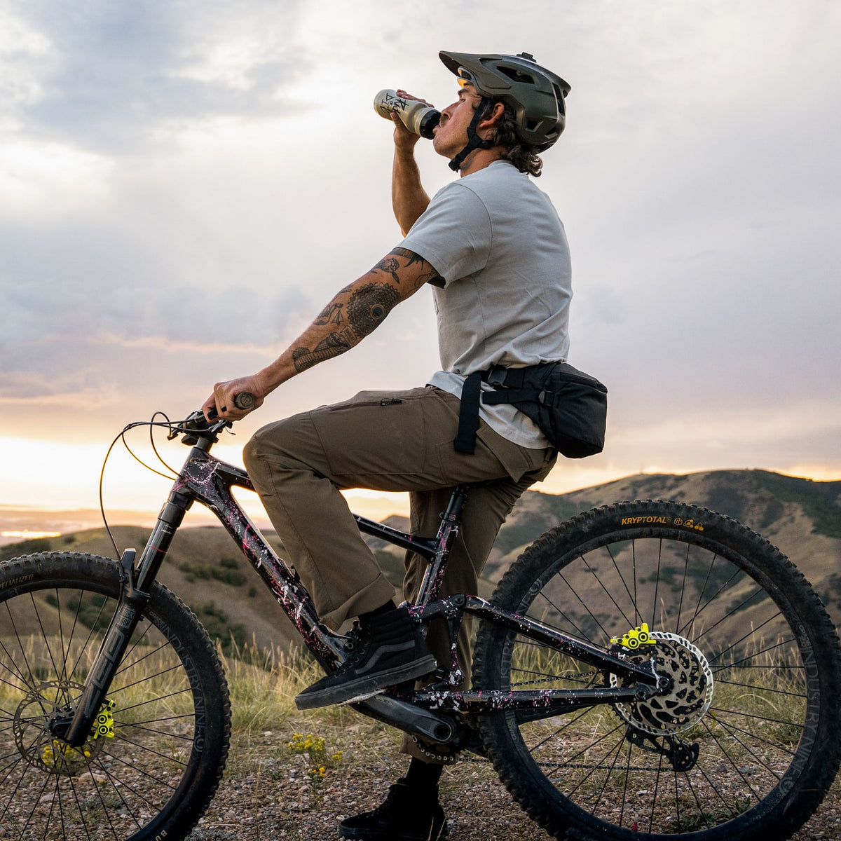 MOUNTAIN HIP PACK 3.5L in Solution Dyed Black - On Bike Resting on Mountain MOUNTAIN HIP PACK 3.5L in Solution Dyed Black - On Bike Resting on Mountain [11003a-SBK
