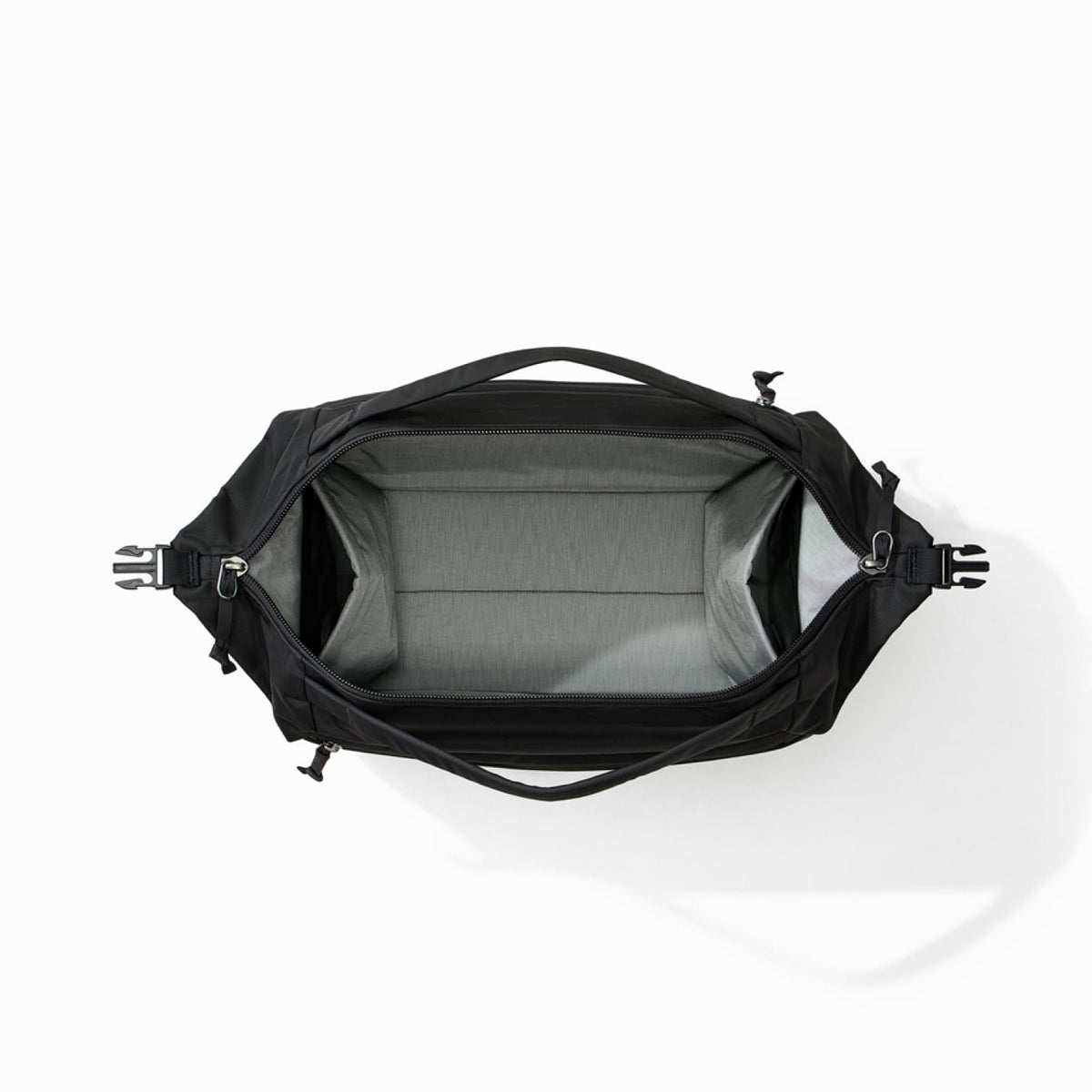 Transit Duffel 25L in Solution Dyed Black - wide opening unpacked Transit Duffel 25L in Solution Dyed Black - wide opening unpacked [13023d-SBK