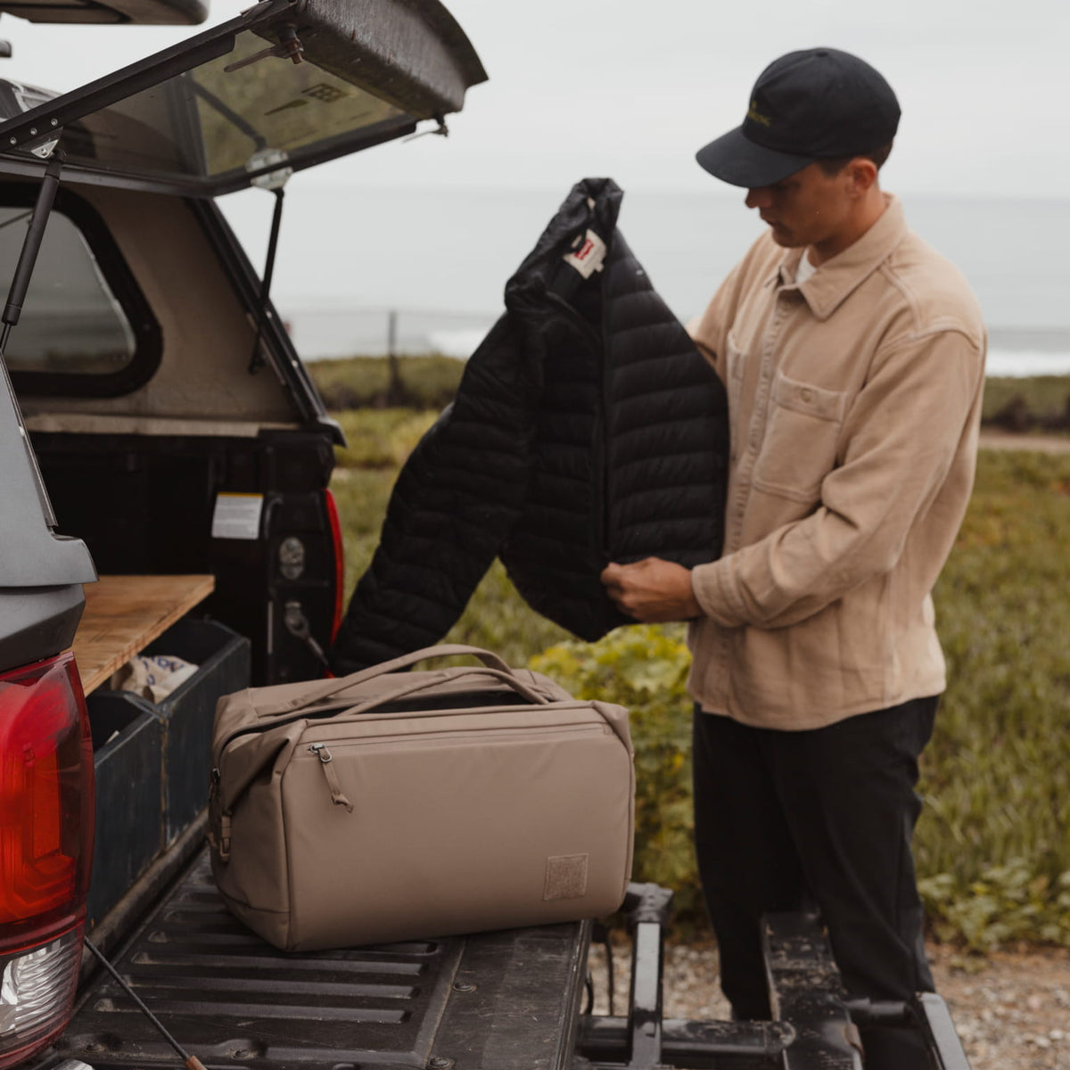 Transit Duffel 35L in Fossil Brown back of truck Transit Duffel 35L in Fossil Brown back of truck [13014d-FBN