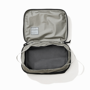 Transit Packing Cube 10L in Black - open and empty