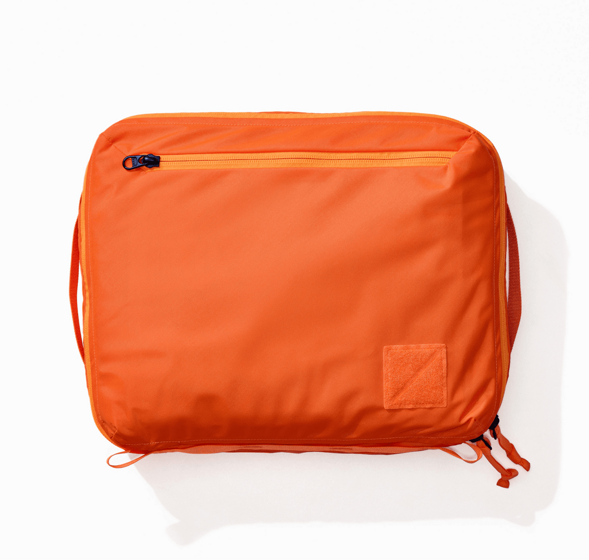 Transit Packing Cube 10L in Hot Orange - overhead view Transit Packing Cube 10L in Hot Orange - overhead view [13021a-HTO
