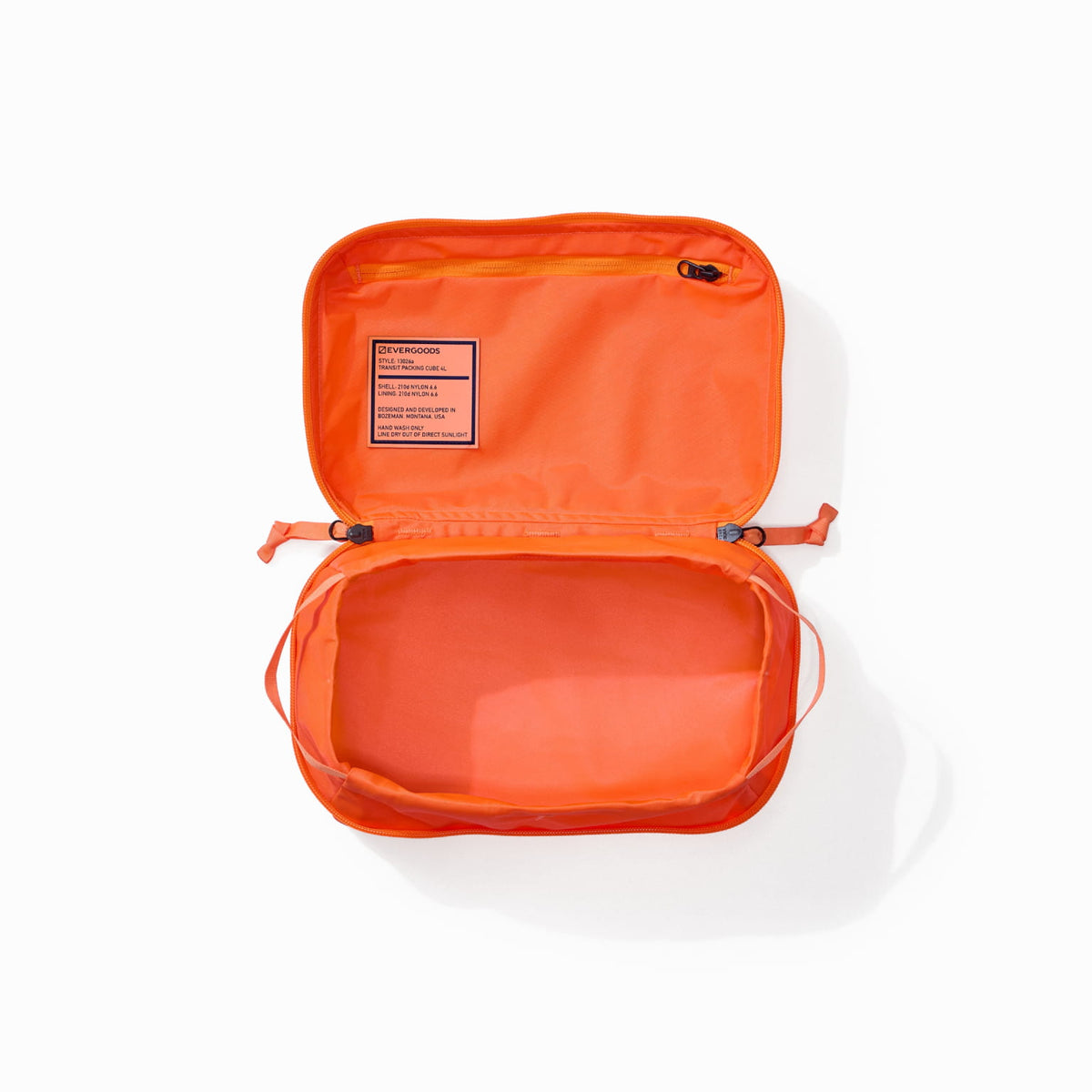Transit Packing Cube 4L in Hot Orange - open and unpacked Transit Packing Cube 4L in Hot Orange - open and unpacked [13026a-HTO