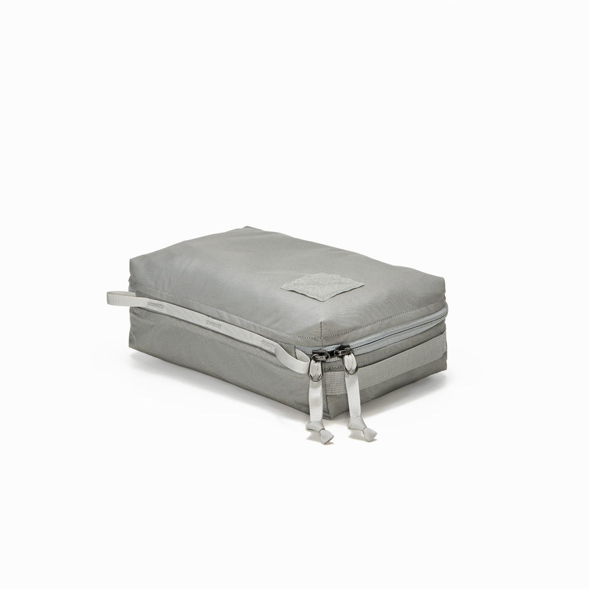 Transit Packing Cube 4L in Standard Gray - closed and laid flat Transit Packing Cube 4L in Standard Gray - closed and laid flat [13026a-STG