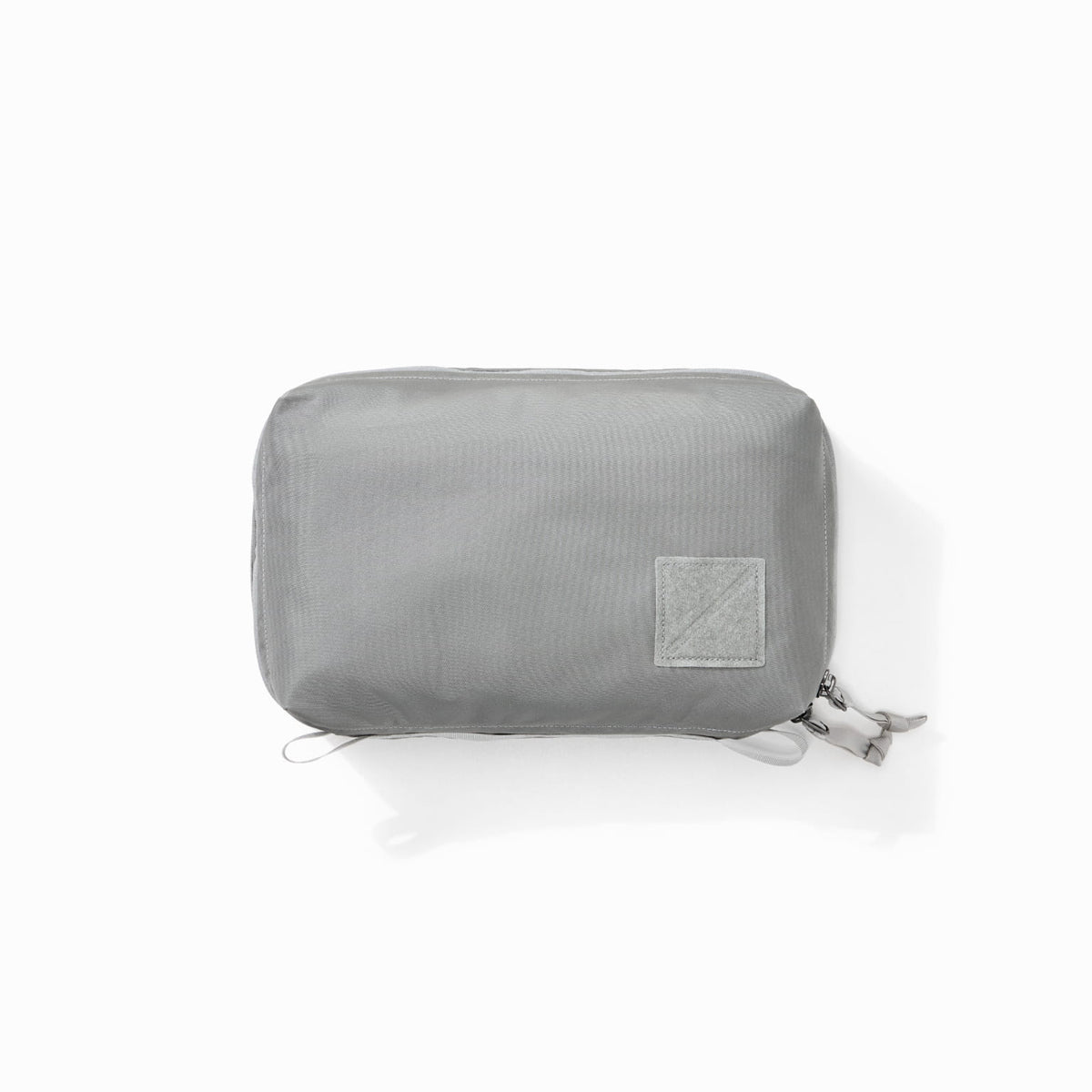 Transit Packing Cube 4L in Standard Gray - overhead image of packed cube Transit Packing Cube 4L in Standard Gray - overhead image of packed cube [13026a-STG