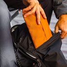 CAP1 burnt orange going into front pocket CAP1 burnt orange going into front pocket [13009a-BRO