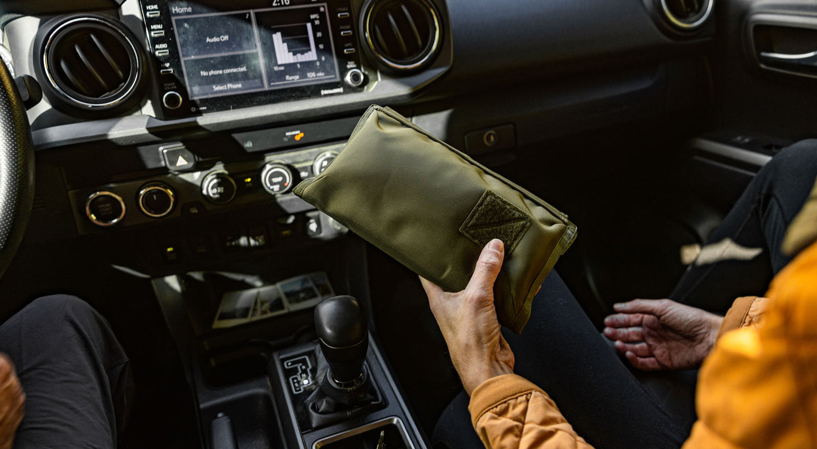 CIVIC Access Pouch 1L - CAP1 - in OD Green as a road trip pouch - shown inside car