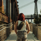 CIVIC Access Sling 2L - CAS2 in OD Green - worn in sling mode walking towards Brooklyn Bridge CIVIC Access Sling 2L - CAS2 in OD Green - worn in sling mode walking towards Brooklyn Bridge [13011c-ODG