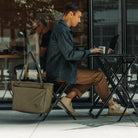 CIVIC Daily Tote 24L in OD Green - CDT24 - hanging next to desk while working remotely CIVIC Daily Tote 24L in OD Green - CDT24 - hanging next to desk while working remotely [13024a-ODG