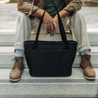 CIVIC Daily Tote 24L in Solution Dyed Black - CDT24 - sitting on steps CIVIC Daily Tote 24L in Solution Dyed Black - CDT24 - sitting on steps [13024a-SBK
