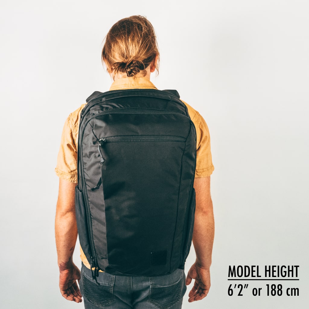 CIVIC Travel Bag 35L in solution dyed black on model