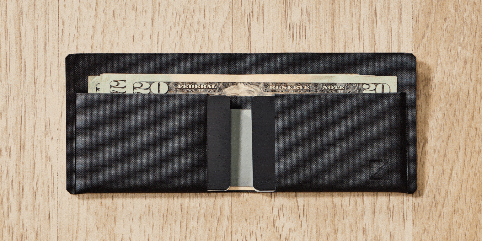 element bifold wallet in solution dyed black showcase all global currency