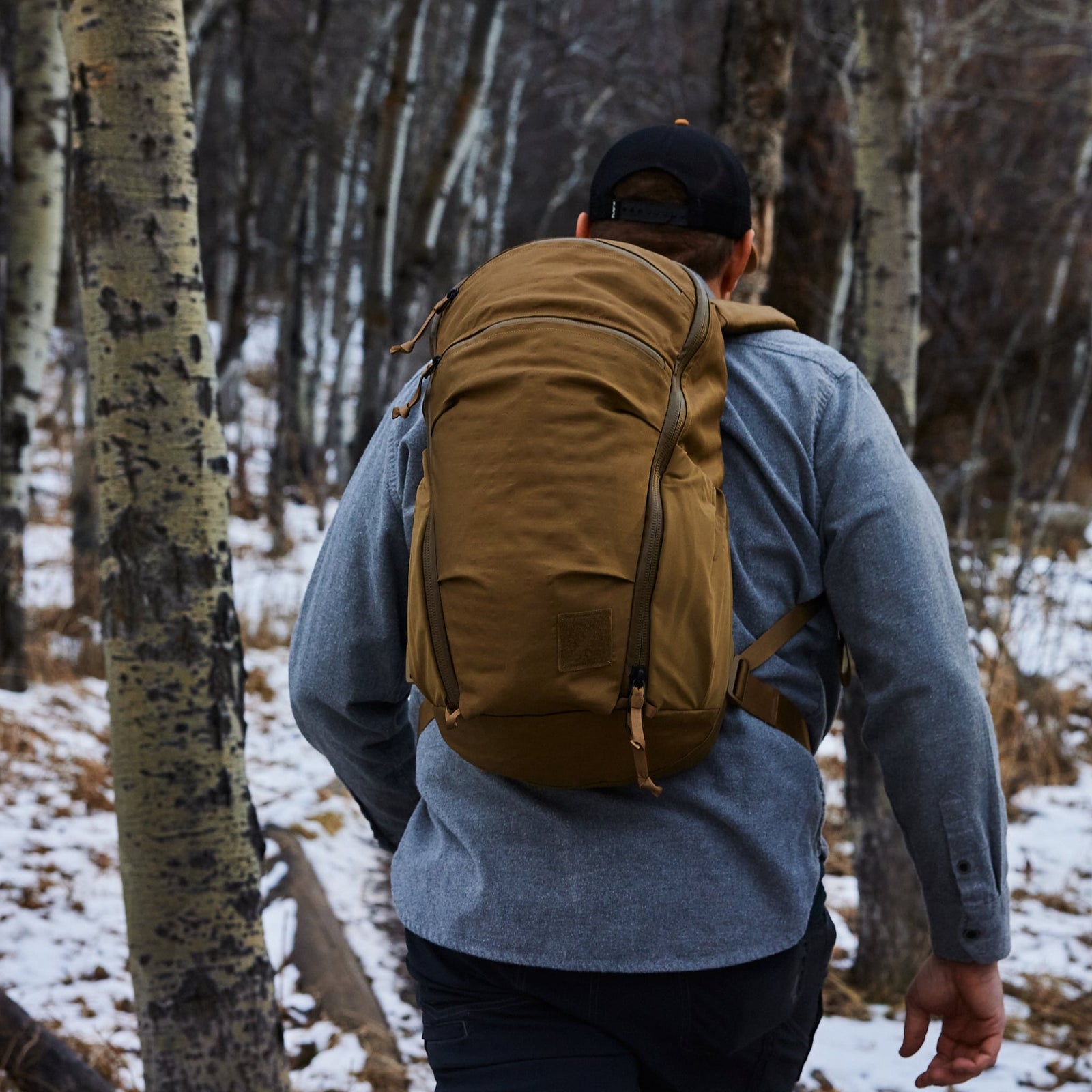 MOUNTAIN Panel Loader 22L in Coyote ECOPAK - Worn in the woods