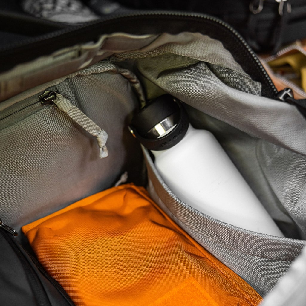 Transit Duffel 35L in Solution Dyed Black - internal water bottle pocket [13014d-SBK]