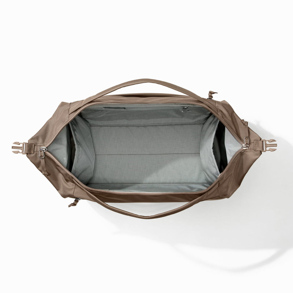 Transit Duffel 35L in Fossil Brown open and unpacked [13014d-FBN]