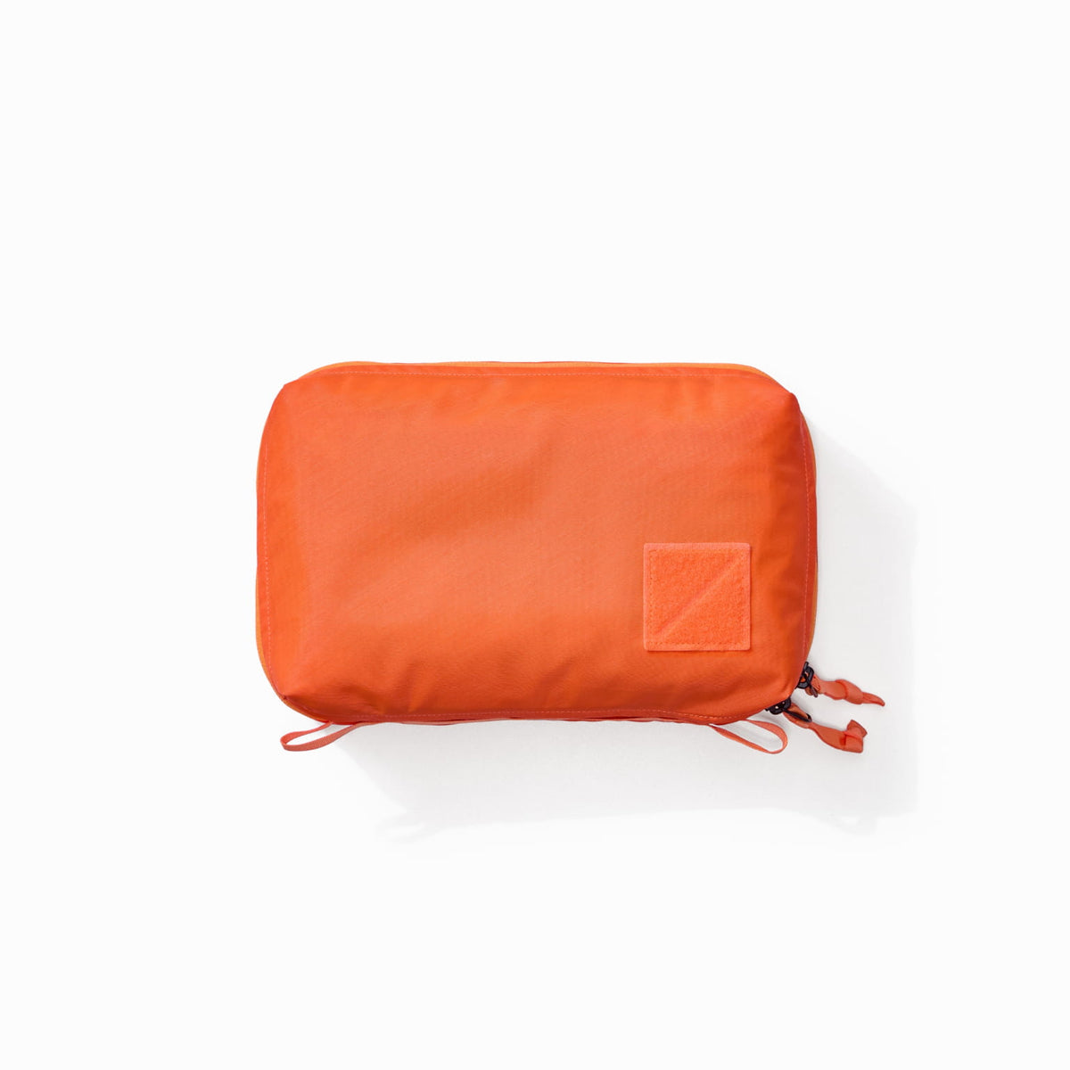 Transit Packing Cube 4L in Hot Orange - overhead view [13026a-HTO]