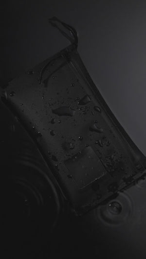 Rain falling on ELEMENT Flat Pouch Solution Dyed Black [12004a-SBK]